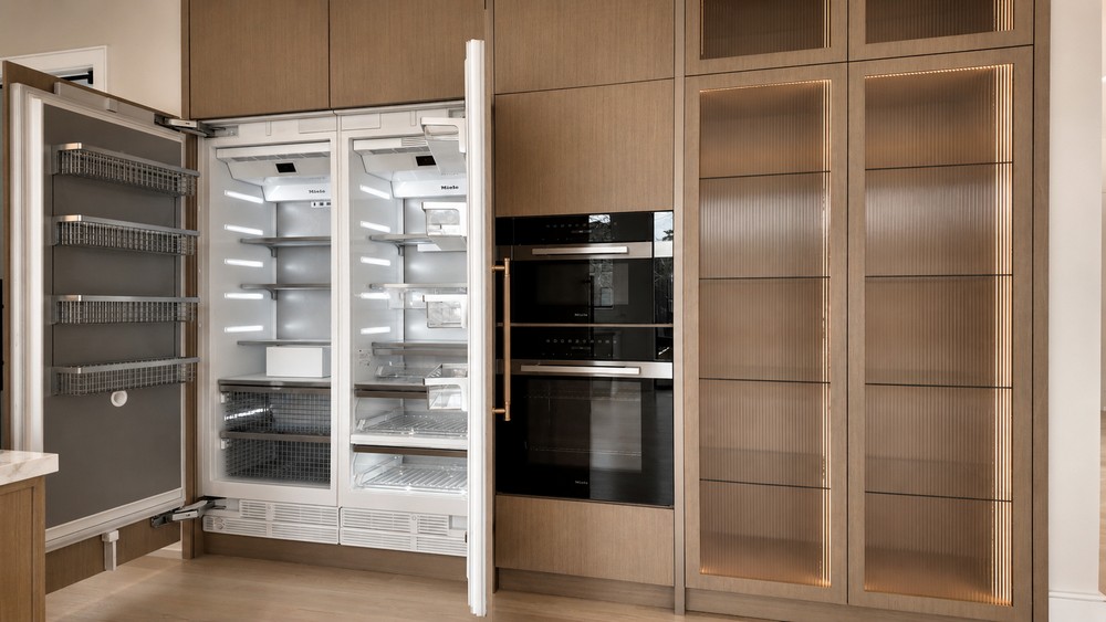 Miele panel-ready fridge and freezer with built-in ovens