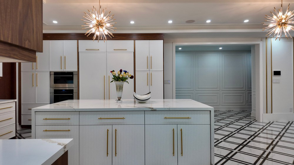 Island facing the panel-ready Sub-Zero refrigeration and Wolf wall ovens
