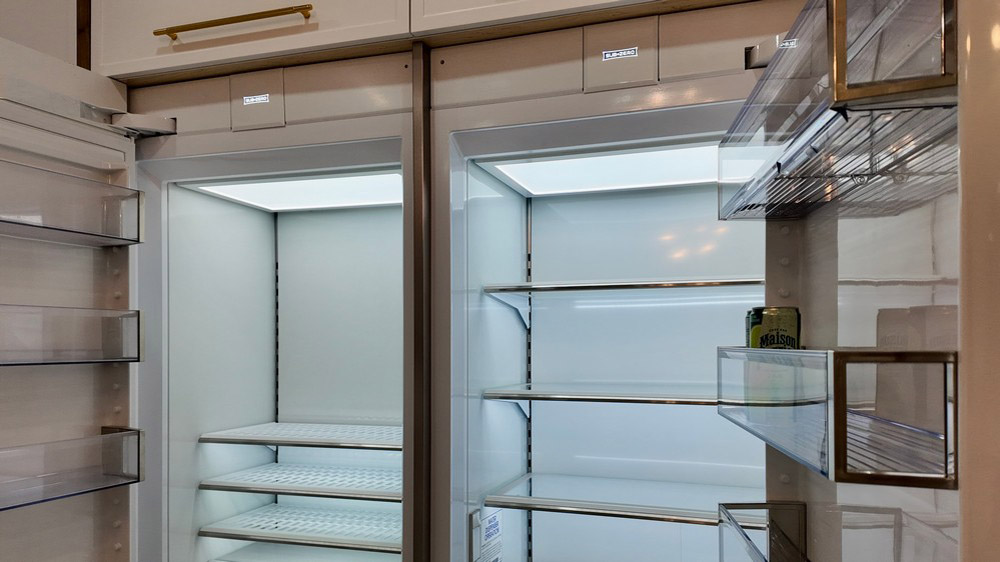 Sub-Zero panel-ready refrigerator and freezer shown open