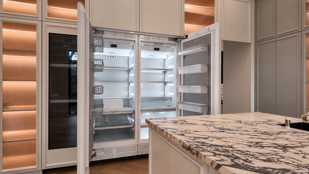 MasterCool refrigerator and freezer columns shown open beside the wine storage