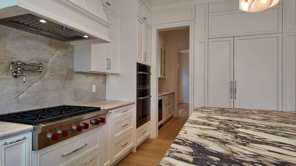 Rangetop wall with the butler pantry visible through the doorway